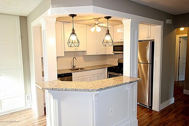 Open Kitchen with Granite Breakfast Bar