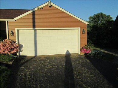 2 car detached garage Additional carport sits behi