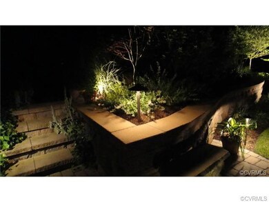 Landscape lighting and stone steps.
