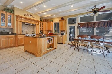 Another view of the Kitchen showing the door to th