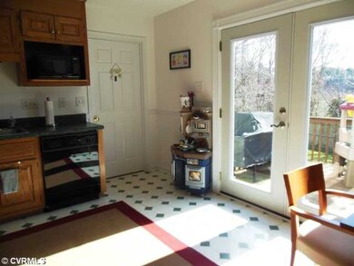 Kitchen - kitchen opening out to deck