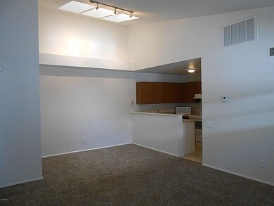 Kitchen and family room with skylights