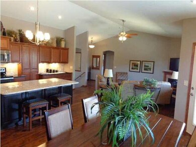 Open floor plan with bedrooms split off to each en