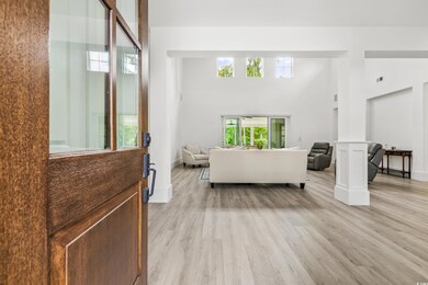 Living room featuring light hardwood / wood-style 