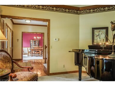 View from Sitting/Living, through front hall, to F