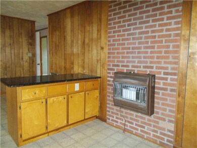 Kitchen has granite counter tops, eat in kitchen