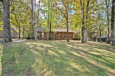 View of this almost 1/2 acre lot nestled far back 