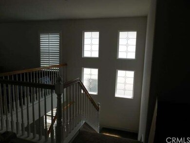 Stairwell, note the leaded glass windows.