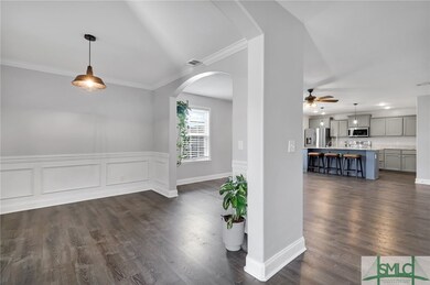 The living space is wide open with an adjoining di