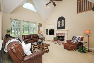 Family room with Vaulted ceiling plus large picture windows overlooking Golf Course