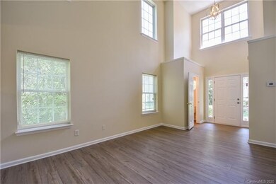 Dramatic 2 story great room with new LVP wide plan