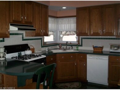 The kitchen sparkles with the newer appliances and