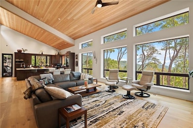 DTBB great room is very similar, but ceiling will slope in the opposite direction, back window wall will be two feet higher, and back wall window will have a fixed window above the operable window