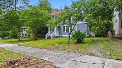 View of front of house featuring a front lawn