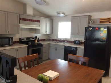 New upgraded black and stainless steel appliances.