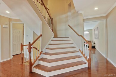 Waterfall staircase, wood floors and treads