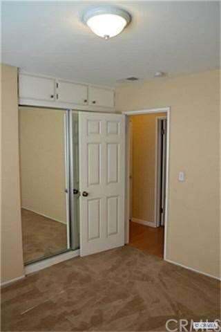 One of four new carpeted and painted bedrooms.