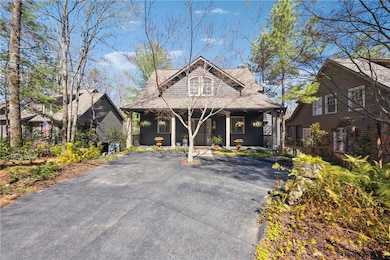 View of front of house with covered porch