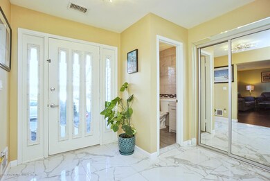 (3) ENTRY FOYER AND HALF BATH