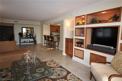 Solid surface wet bar and matching wood trimmed en