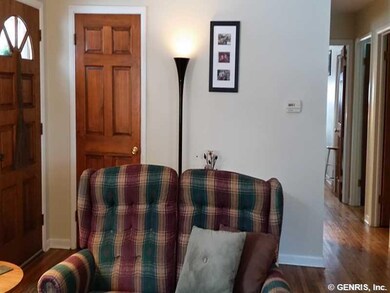 Living Room. Living room is open to kitchen, hardw