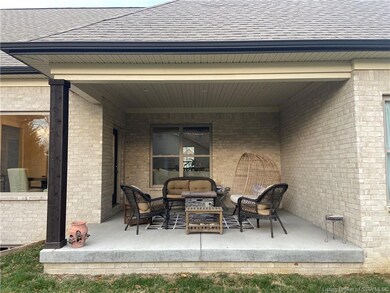 Covered porch/patio could easily be screened in if