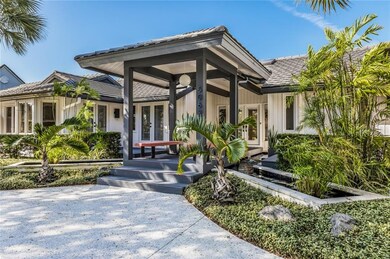 Covered front walkway and koi pond