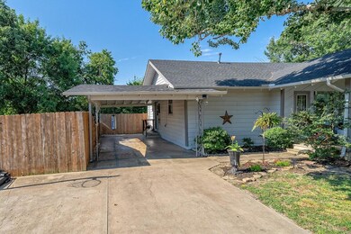 Ranch-style house with a carport