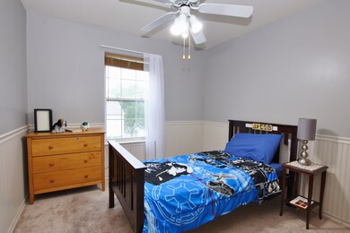 Freshly Painted Bedroom with Wainscoting and New C