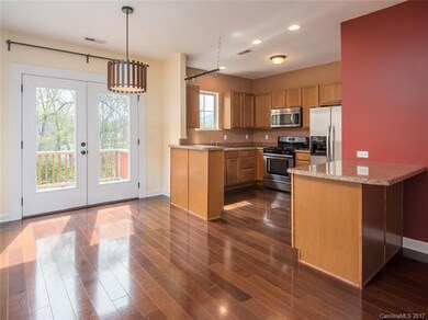 Open kitchen with extra cabinetry and breakfast ba