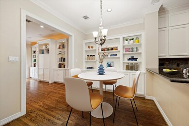 Within the Kitchen is a breakfast room alongside custom built-ins and storage.