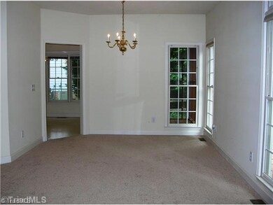 Dining Room. The Dining Room is off the Great Room and looks out into the treed back yard.