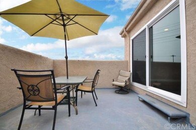Balcony adjacent to master bedroom and kitchen