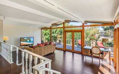 Two sets of glass doors leading to the stonework p