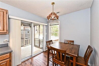An abundance of light in kitchen/dining area.