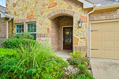 This captivating home boasts a grand curbside appe