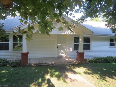 Home features low-maintenance vinyl siding and covered front porch.