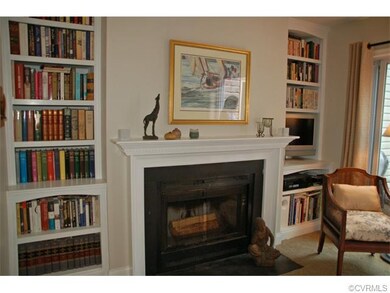 Fireplace with custom built-ins.  There is cable h