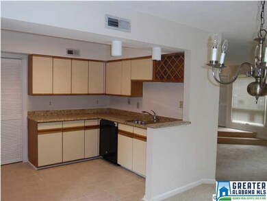 View of kitchen from dining room