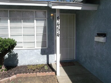 WELCOMING SHELTERED PORCH WITH SECURITY SCREEN DOO