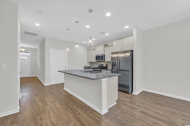 Kitchen with appliances with stainless steel finis