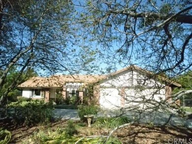 Front from street. Private circular driveway