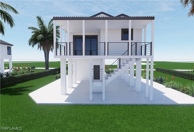 Back of property with access  stairway, and elevat