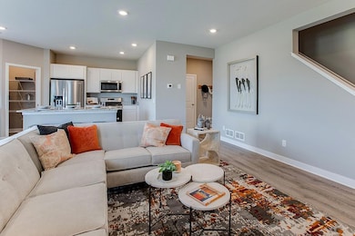 The epitome of the open concept home design!! (Photo of model, colors are similar)