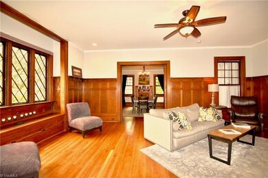 Gracious livingroom with open flow to dining, kitchen and foyer. Check out the window seat in formal living room too.