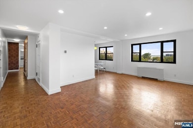 Large living room with big windows for natural light