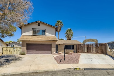 Traditional home with concrete driveway, a gate, s