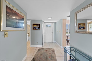 Entryway featuring light tile patterned flooring