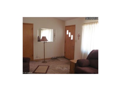 The front door welcomes you into the home and star