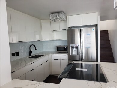 Renovated kitchen with newer appliances.